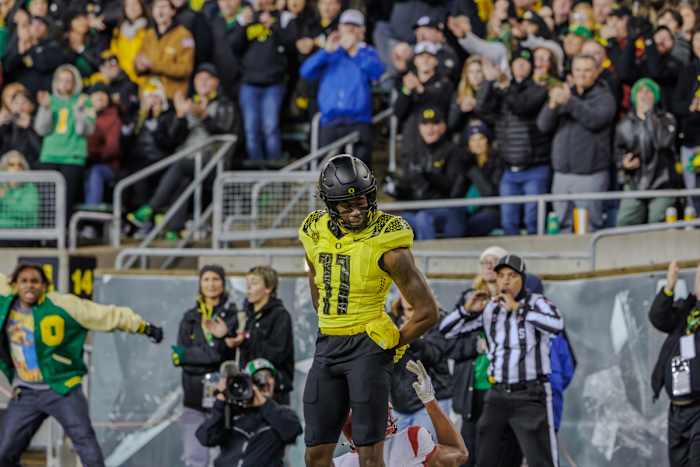 Oregon Ducks defensive back Trikweze Bridges celebrates a pass breakup against USC wide receiver Brenden Rice.